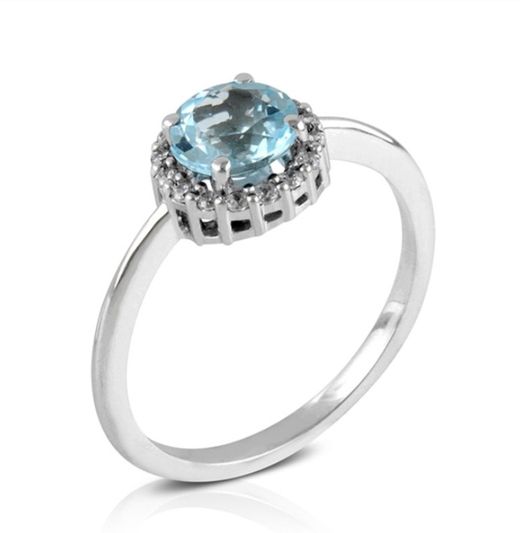 Anillo en oro blanco 18 quilates topacio azul y brillantes